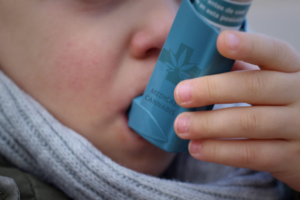 Child trying asthma with cannabis inhaler