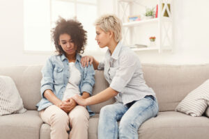 therapist comforts teen