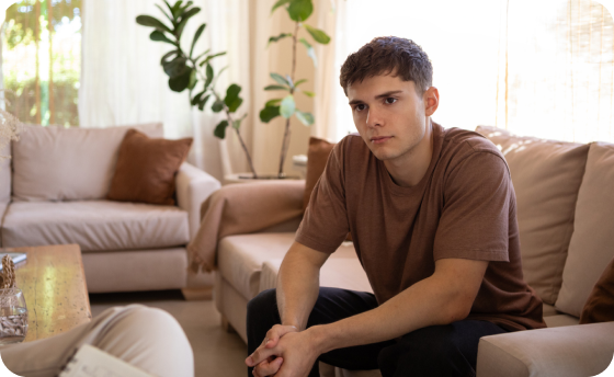 Teen Sitting on Couch