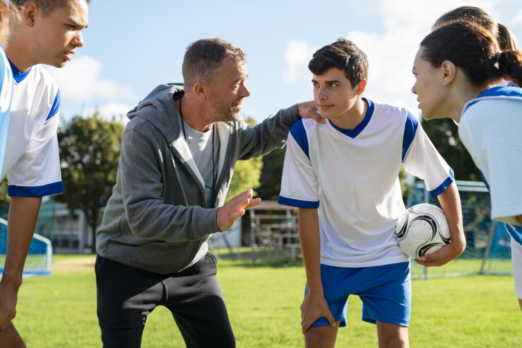 teen sports - coach and players