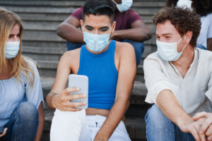 teens wearing masks during covid