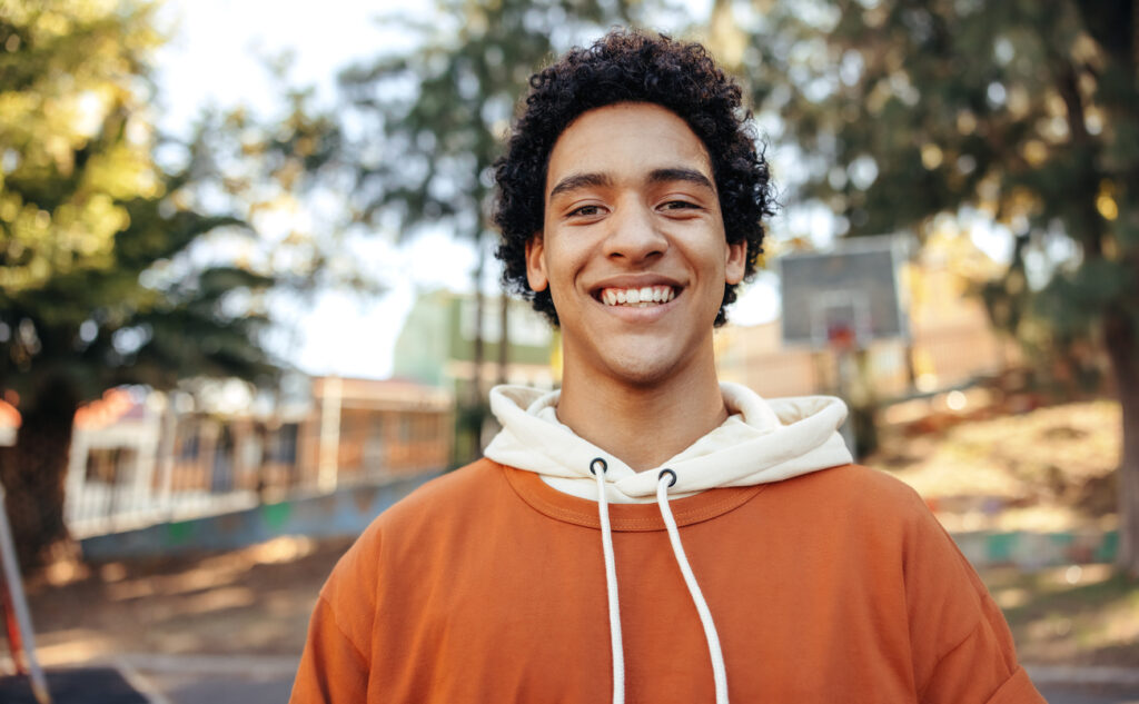 young teen male smiling